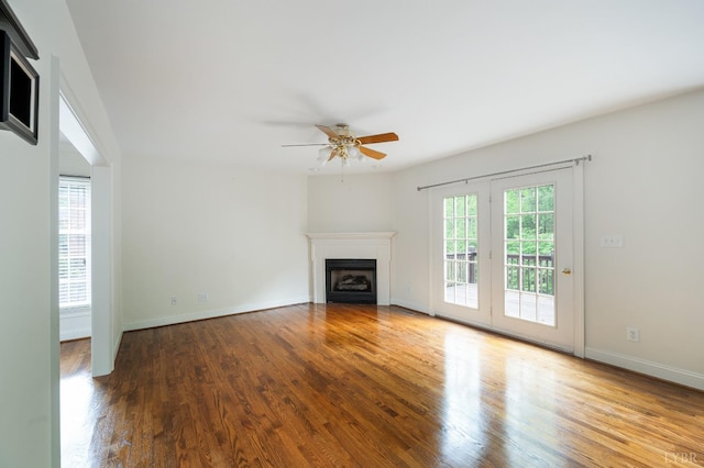 528 Lady Slipper Ln, Lynchburg, VA 24502 - unfurnished living room with a ceiling fan, wood finished floors, and a fireplace