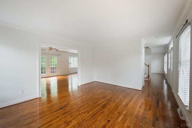 528 Lady Slipper Ln, Lynchburg, VA 24502 - spare room with wood finished floors, ornamental molding, ceiling fan, and stairway
