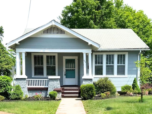 bungalow-style home featuring a porch