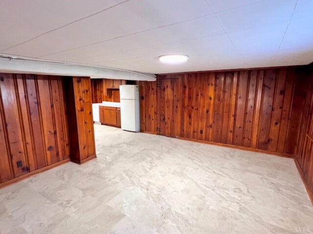 306 Oakridge Blvd, Lynchburg, VA 24502 - finished basement featuring wooden walls, baseboards, and freestanding refrigerator