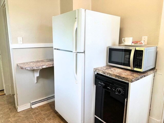 306 Oakridge Blvd, Lynchburg, VA 24502 - kitchen with white appliances and visible vents