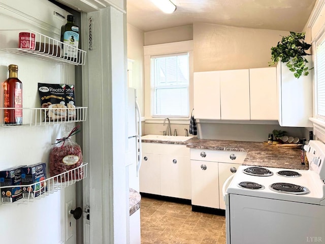 306 Oakridge Blvd, Lynchburg, VA 24502 - kitchen with a sink, electric stove, white cabinets, and a healthy amount of sunlight