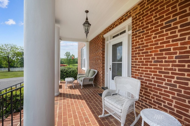 view of patio featuring a porch