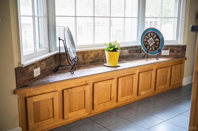 interior details featuring decorative backsplash