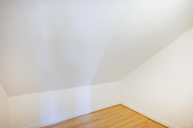 1348 Lake Shore Dr, Forest, VA 24551 - additional living space with baseboards, light wood finished floors, and vaulted ceiling