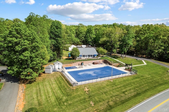 1348 Lake Shore Dr, Forest, VA 24551 - view of pool featuring a yard, a forest view, an outbuilding, and a storage unit