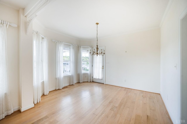 1348 Lake Shore Dr, Forest, VA 24551 - unfurnished room with a chandelier, light wood finished floors, baseboards, and crown molding