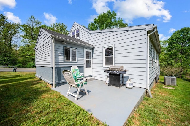 906 Elon Rd, Madison Heights, VA 24572 - rear view of property featuring a patio, a yard, and central air condition unit