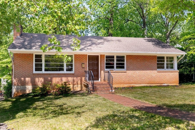 336 Biltmore Ave, Lynchburg, VA 24502 - single story home with a front lawn, a shingled roof, brick siding, and a chimney