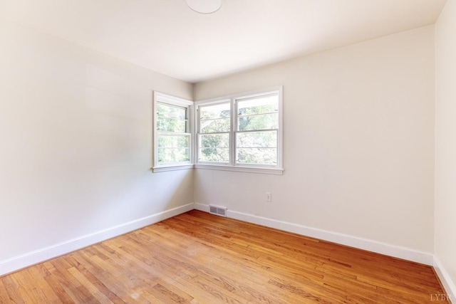 336 Biltmore Ave, Lynchburg, VA 24502 - spare room featuring baseboards, light wood-style flooring, and visible vents
