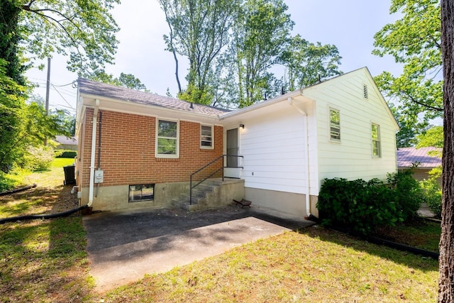 336 Biltmore Ave, Lynchburg, VA 24502 - back of house featuring a yard and brick siding