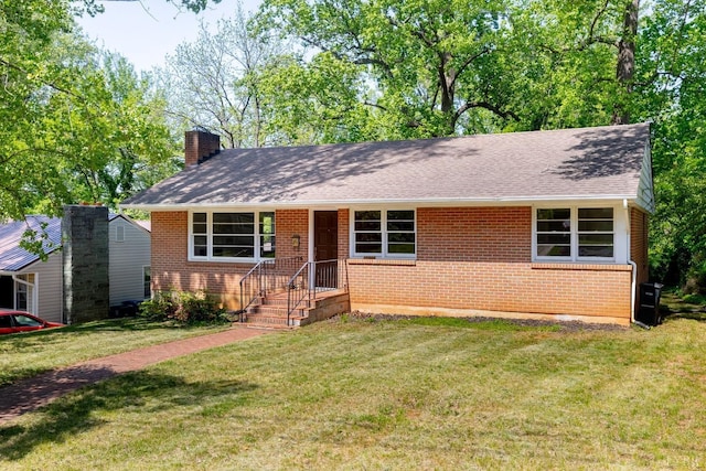 336 Biltmore Ave, Lynchburg, VA 24502 - single story home with a chimney, a shingled roof, brick siding, and a front lawn