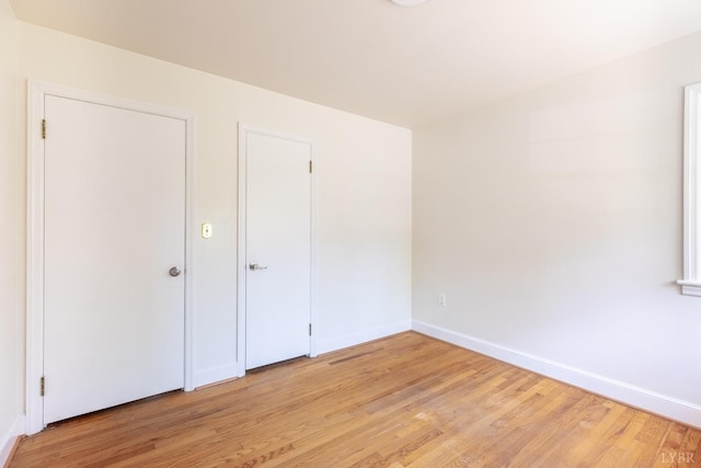 336 Biltmore Ave, Lynchburg, VA 24502 - unfurnished bedroom featuring baseboards and light wood-style floors