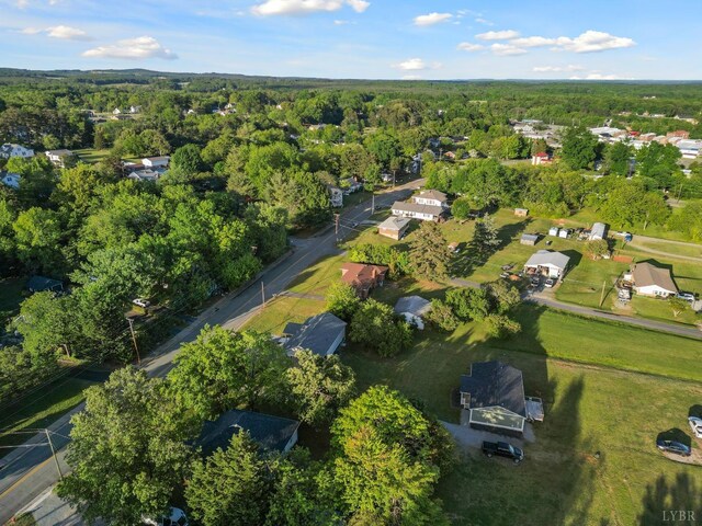 507 Henry St, Gretna, VA 24557 - birds eye view of property with a forest view