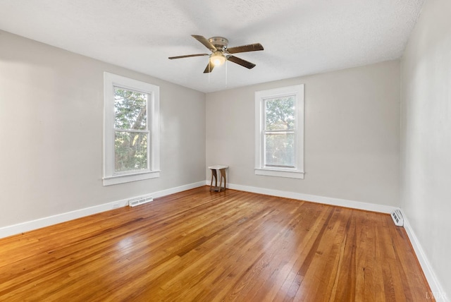 507 Henry St, Gretna, VA 24557 - unfurnished room with a ceiling fan, baseboards, light wood-type flooring, and visible vents