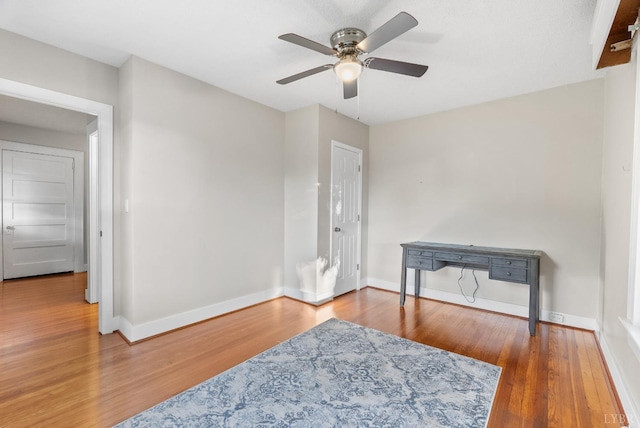 507 Henry St, Gretna, VA 24557 - living area featuring a ceiling fan, baseboards, and wood finished floors