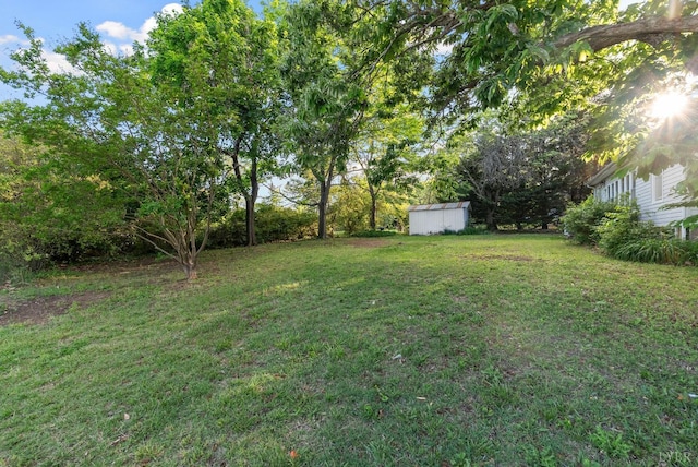 507 Henry St, Gretna, VA 24557 - view of yard featuring an outdoor structure and a storage shed
