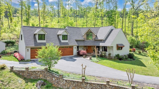 122 Gravelly Ridge Rd, Troutville, VA 24175 - new england style home featuring a garage, a front lawn, roof with shingles, a porch, and driveway