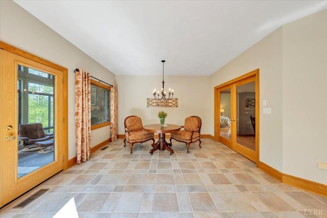 122 Gravelly Ridge Rd, Troutville, VA 24175 - dining area with baseboards, a notable chandelier, french doors, and visible vents