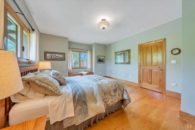 122 Gravelly Ridge Rd, Troutville, VA 24175 - bedroom featuring light wood finished floors and baseboards
