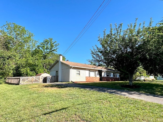 139 Abbitts Dr, Madison Heights, VA 24572 - view of front of house with a chimney and brick siding