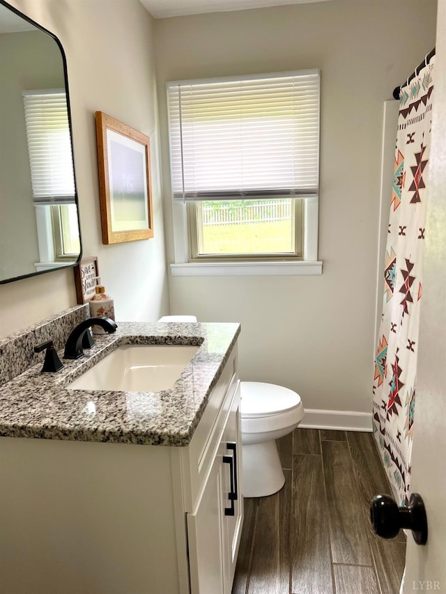 139 Abbitts Dr, Madison Heights, VA 24572 - full bath with vanity, toilet, baseboards, wood finished floors, and curtained shower