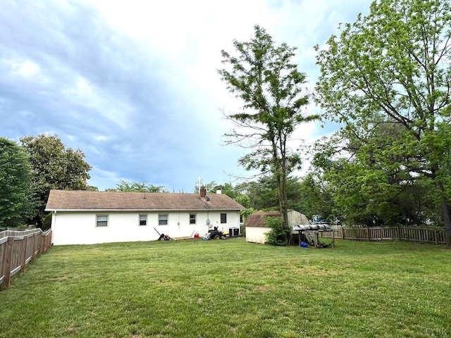 139 Abbitts Dr, Madison Heights, VA 24572 - back of property with a chimney