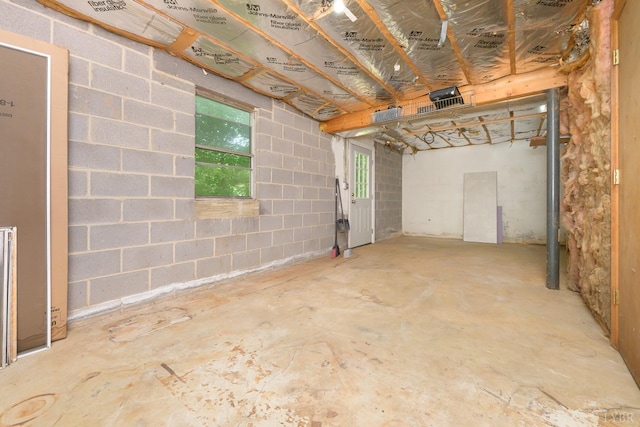 basement featuring concrete block wall
