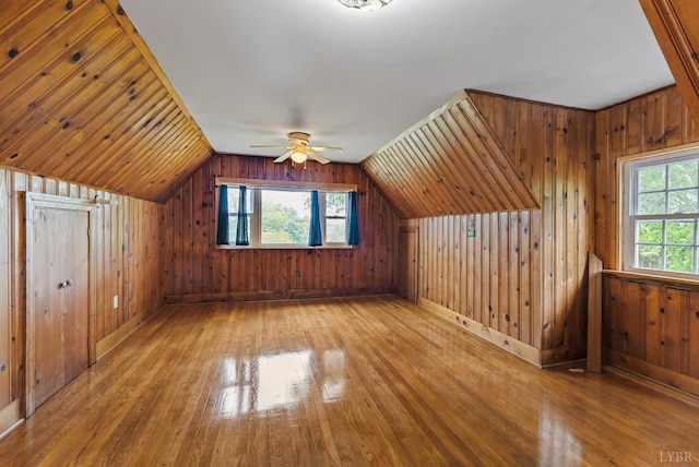 600 9th St, Altavista, VA 24517 - bonus room with vaulted ceiling, wooden walls, wood-type flooring, and a ceiling fan