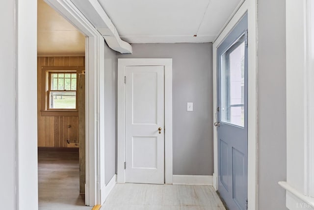 600 9th St, Altavista, VA 24517 - entryway featuring wood walls, baseboards, and light wood-style floors