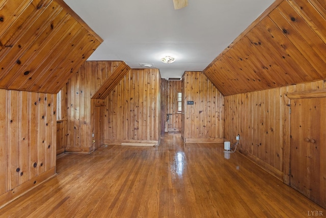 600 9th St, Altavista, VA 24517 - additional living space with baseboards, wood walls, wood finished floors, and lofted ceiling