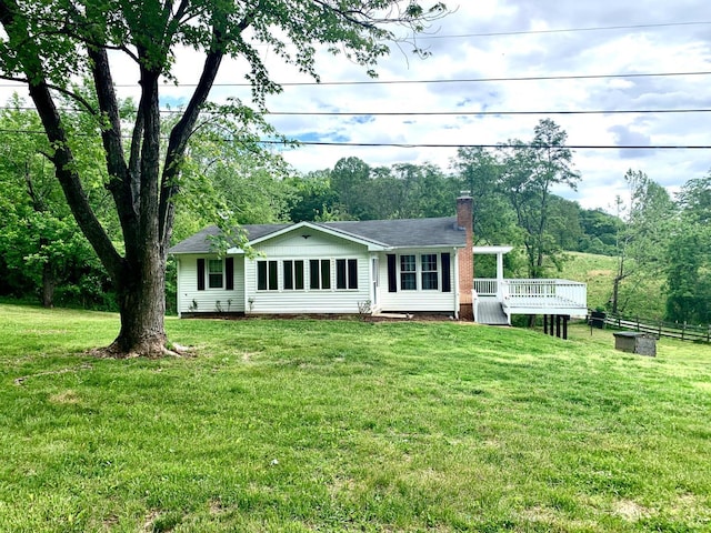 1349 Murray Hollow Rd, Thaxton, VA 24174 - ranch-style house featuring a chimney, a deck, a front lawn, and a shingled roof