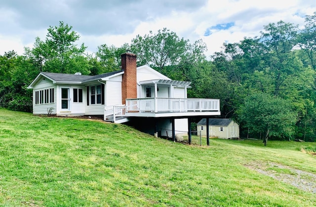 1349 Murray Hollow Rd, Thaxton, VA 24174 - back of house featuring a pergola, a chimney, a deck, and a lawn