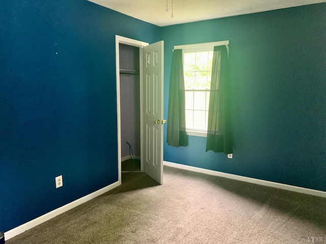 1349 Murray Hollow Rd, Thaxton, VA 24174 - unfurnished bedroom with carpet flooring, baseboards, and a closet