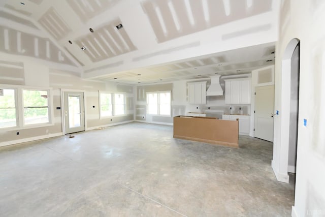 25 Stoney Ridge Blvd, Forest, VA 24551 - unfurnished living room with unfinished concrete flooring and baseboards