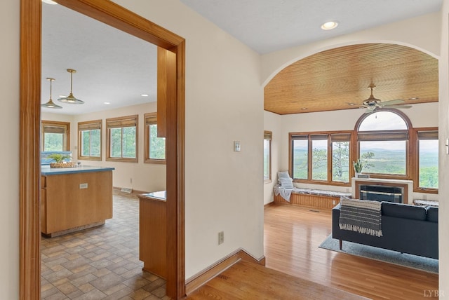 885 Cresthill Rd, Lynchburg, VA 24504 - hall with plenty of natural light, baseboards, arched walkways, and recessed lighting