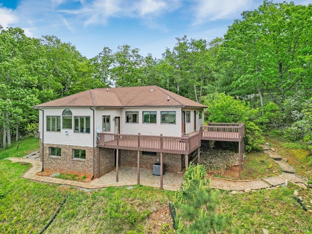 885 Cresthill Rd, Lynchburg, VA 24504 - rear view of house featuring a wooden deck, a patio area, a yard, central AC, and roof with shingles