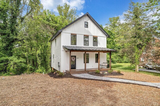 modern farmhouse with a porch