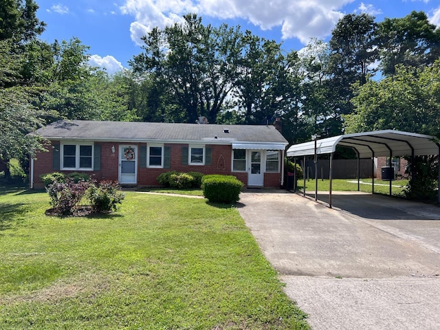 202 Dalton St, Gretna, VA 24557 - view of front of house with concrete driveway, a front lawn, brick siding, and a detached carport