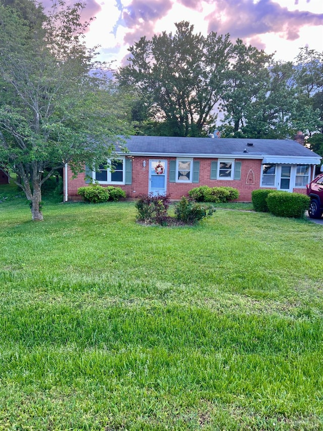 202 Dalton St, Gretna, VA 24557 - ranch-style home with brick siding and a front lawn