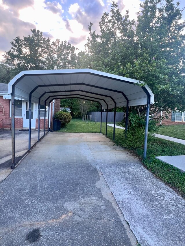 202 Dalton St, Gretna, VA 24557 - view of car parking with a detached carport and driveway