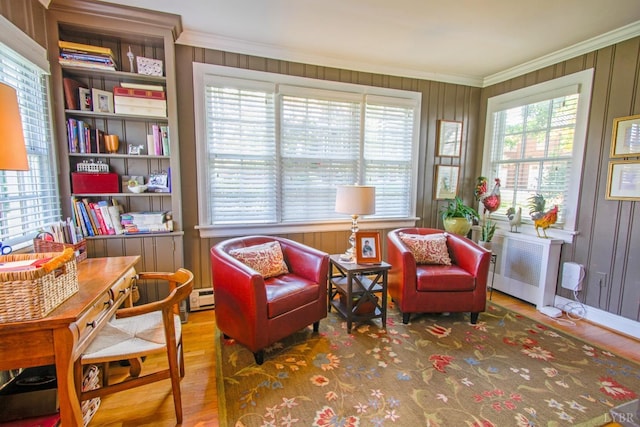 3845 Peakland Pl, Lynchburg, VA 24503 - living area with wood finished floors, crown molding, radiator heating unit, baseboard heating, and wood walls