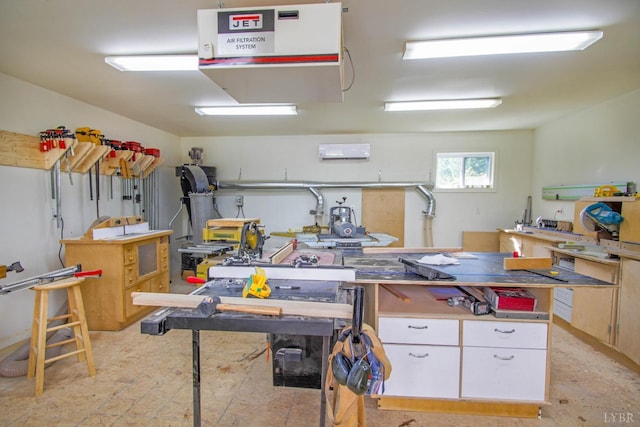 garage with a workshop area