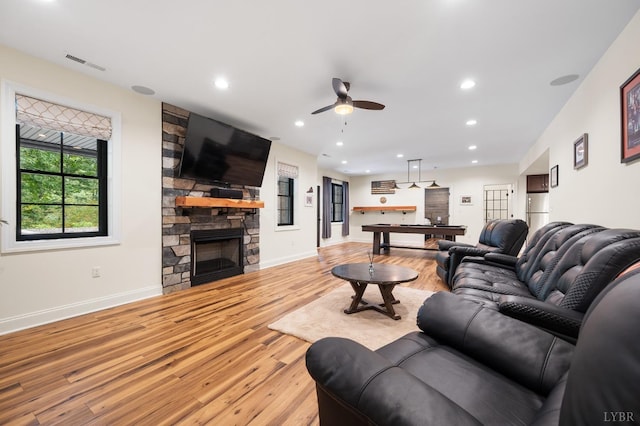 1228 Mill Dam Ln, Forest, VA 24551 - living area featuring a ceiling fan, light wood-style floors, billiards, a stone fireplace, and recessed lighting