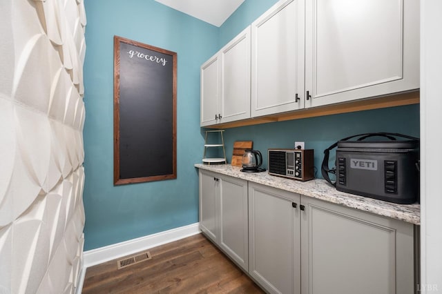1228 Mill Dam Ln, Forest, VA 24551 - bar with dark wood-type flooring and baseboards