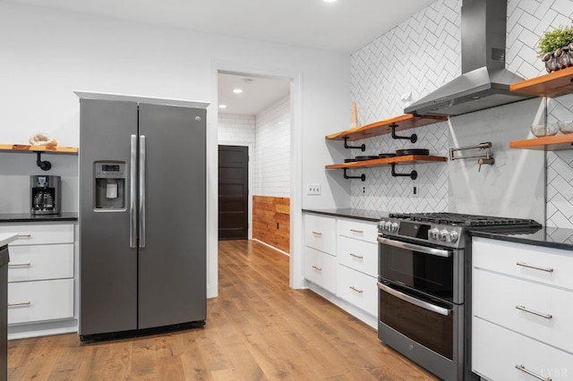 1228 Mill Dam Ln, Forest, VA 24551 - kitchen with stainless steel appliances, open shelves, wall chimney exhaust hood, decorative backsplash, and white cabinetry