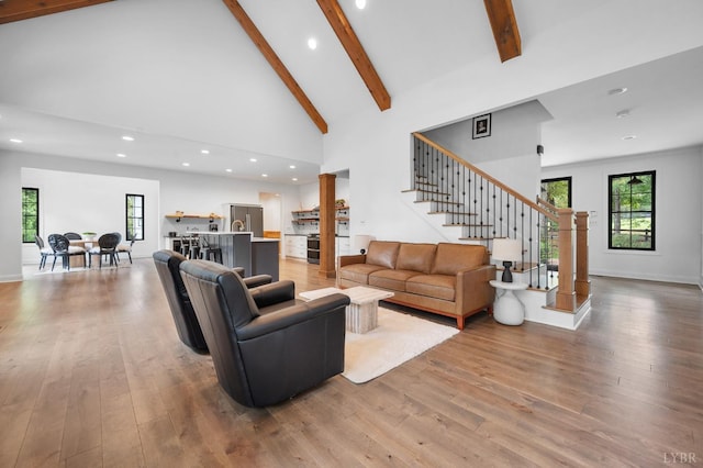 1228 Mill Dam Ln, Forest, VA 24551 - living area with light wood-style floors, recessed lighting, beam ceiling, stairway, and healthy amount of natural light