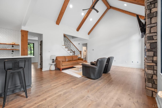 1228 Mill Dam Ln, Forest, VA 24551 - living room with high vaulted ceiling, ceiling fan, stairs, light wood-style flooring, and beam ceiling