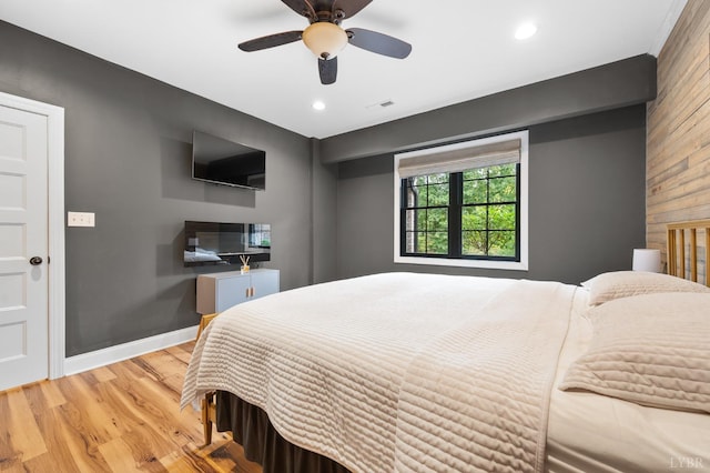 1228 Mill Dam Ln, Forest, VA 24551 - bedroom featuring wood finished floors, wood walls, recessed lighting, a ceiling fan, and baseboards