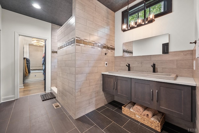 1228 Mill Dam Ln, Forest, VA 24551 - full bath featuring double vanity, a chandelier, recessed lighting, and tile patterned flooring